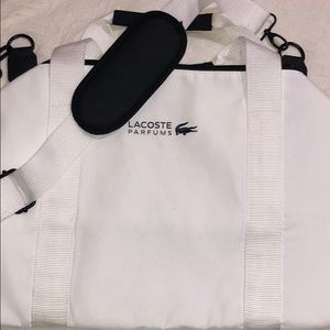 White Lacoste travel bag